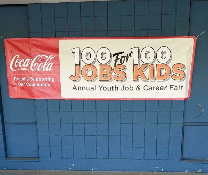 Community event banner that reads 100 JOBS FOR 100 KIDS awkwardly, exemplifying hilarious badly designed signs.