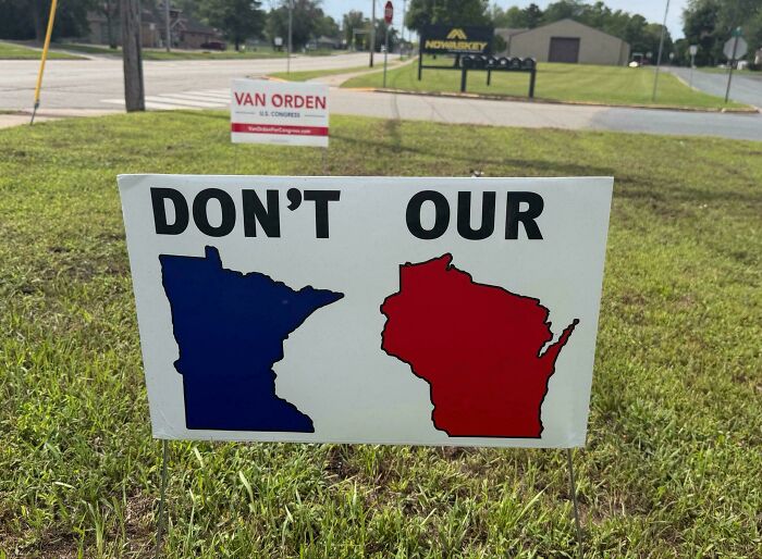 Lawn political sign with confusing layout representing badly designed signs.