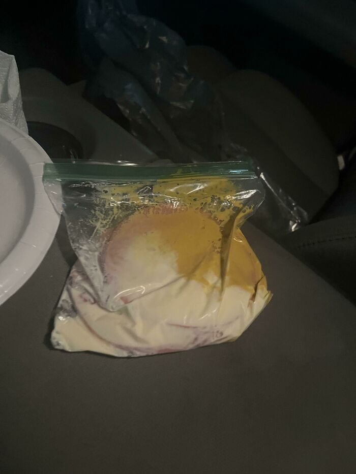 A plastic Ziploc bag containing a messy mixture of mustard and mayonnaise, showing things wives do.
