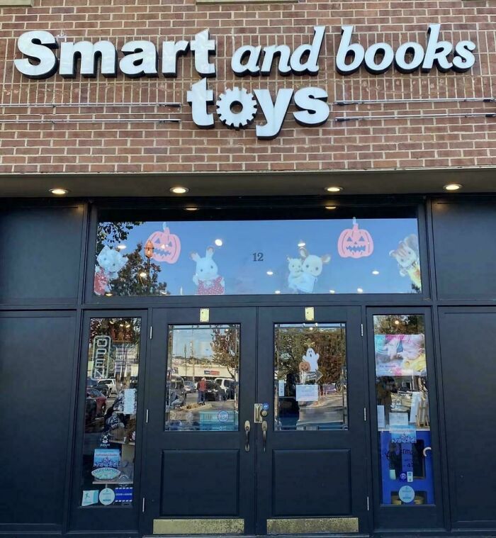 Storefront signage with confusingly arranged word order, showing badly designed signs.