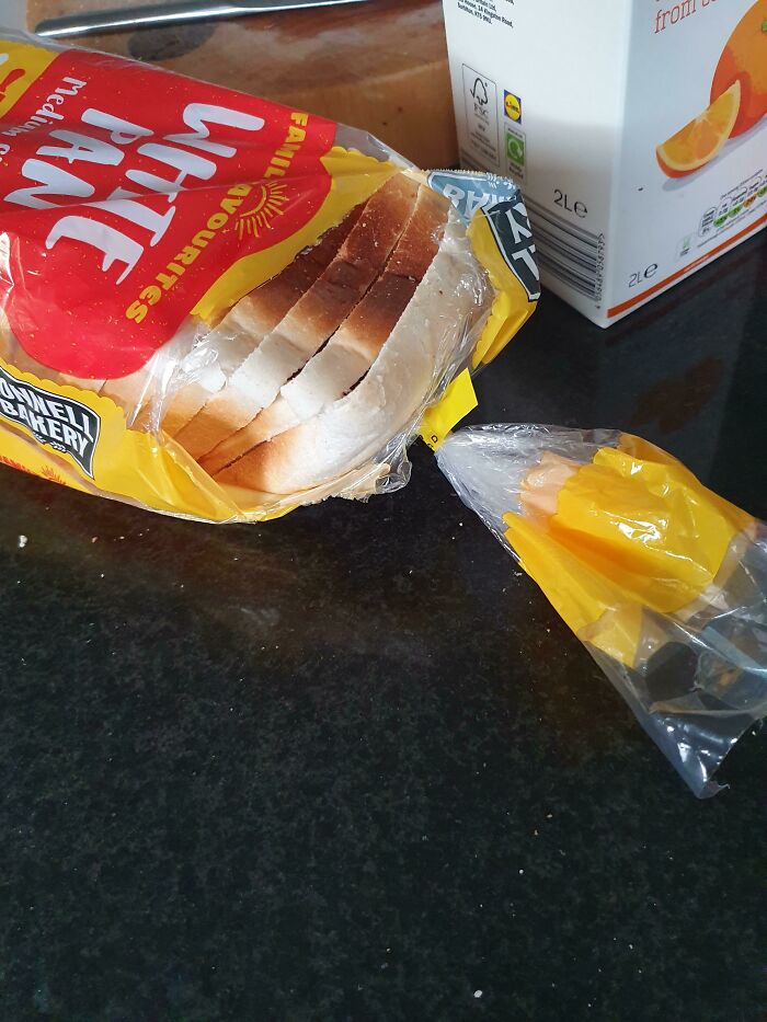 A poorly opened loaf of bread on a counter, showing funny things wives do