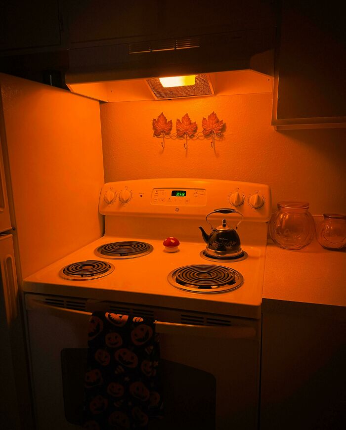 An old-fashioned stove with orange glow evoking 90s nostalgia