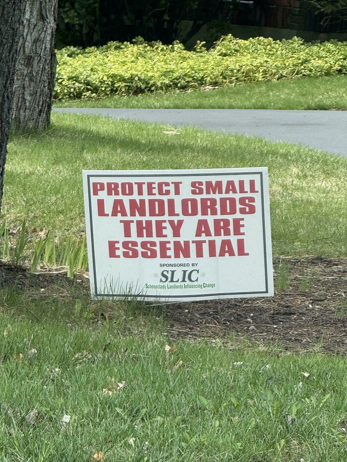Yard sign from a landlords group reading Protect Small Landlords They Are Essential.