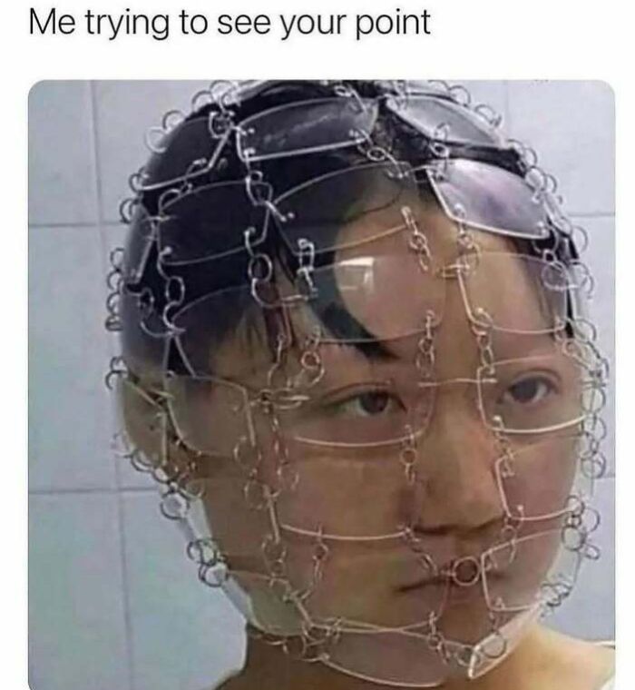 Meme of a person covered in glasses trying to see a point, showing relatable memes for introverts.