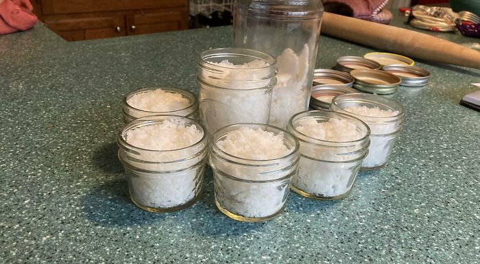 Cool photos of glass jars filled with fresh white snow preserved in a kitchen