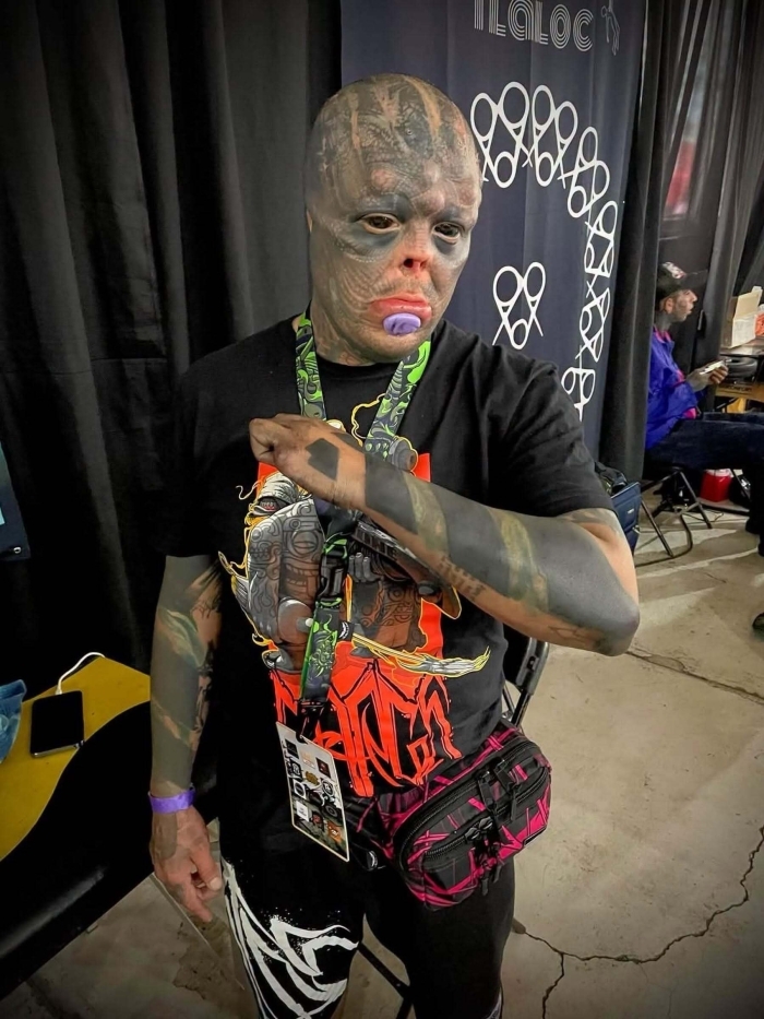 Man Undergoes Extreme Body Modifications—Including Cutting His Fingers And Nose—To Become “The Amphibian Man” Man Undergoes Extreme Body Modifications—Including Cutting His Fingers And Nose—To Become “The Amphibian Man”