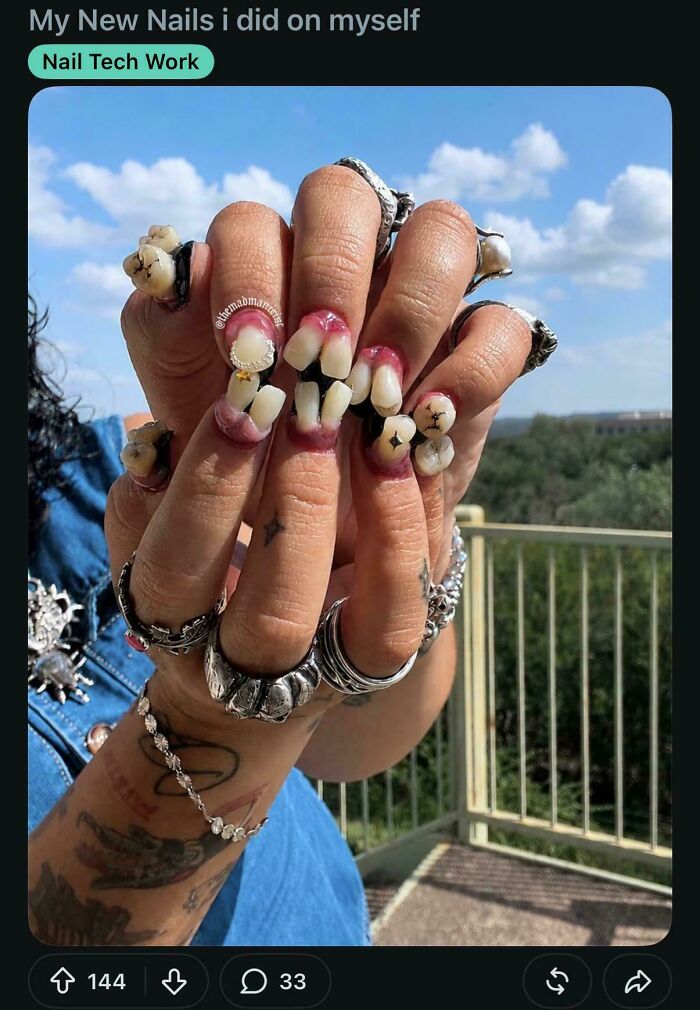 Hands with fingernails styled to look like realistic human teeth, among awful creations far too well made to ignore.