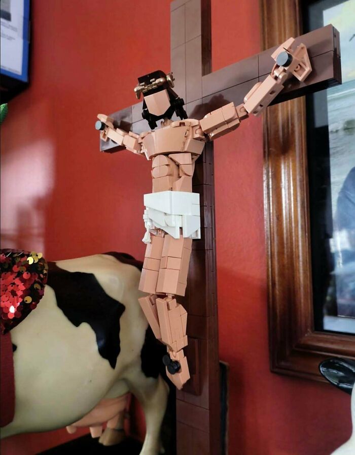 A detailed crucifix figure assembled from toy bricks showing unique creations.