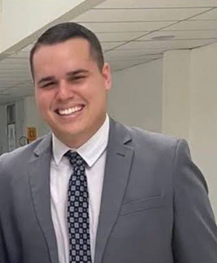 A smiling man in a grey suit and tie representing the boss. A smiling man in a grey suit and tie representing the boss.