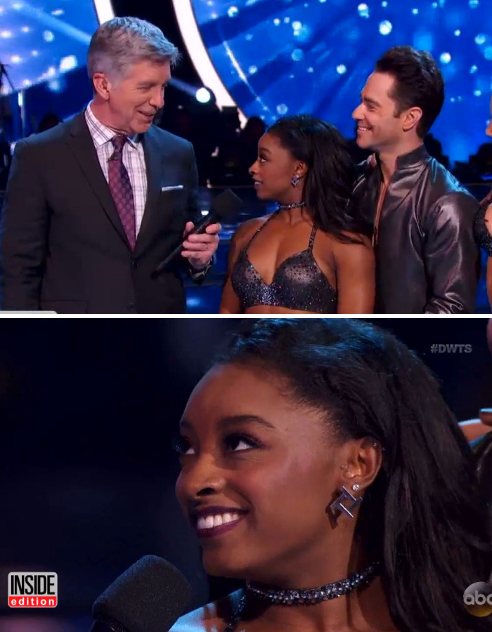 Simone Biles, a female star, smiles after putting a man in his place during a TV interview.