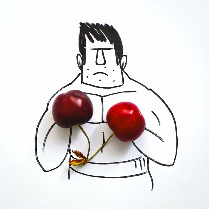 Playful illustrations with red cherries used as boxing gloves on a drawn boxer by Romain Joly