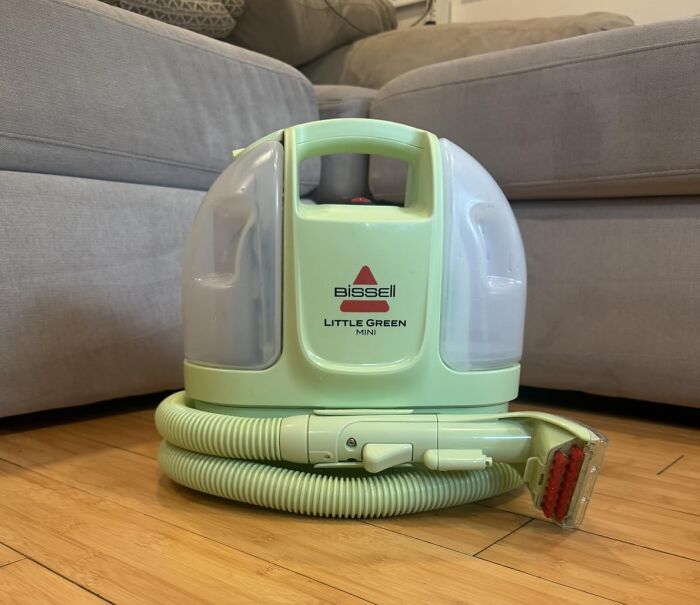 A green Bissell Little Green Mini carpet cleaner, featured in Prime Big Deal Days recommendations.