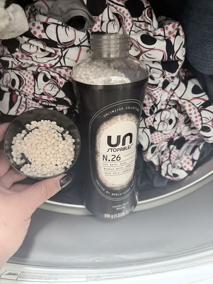Unstopables laundry scent booster beads in a measuring cap on Prime Big Deal Days