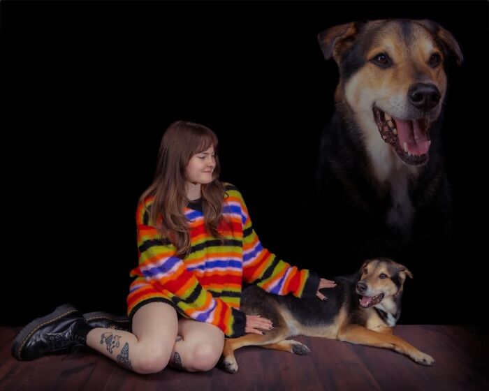 A silly portrait of pets and their owners featuring a woman in a colorful sweater petting her dog, with a large dog head floating above them.