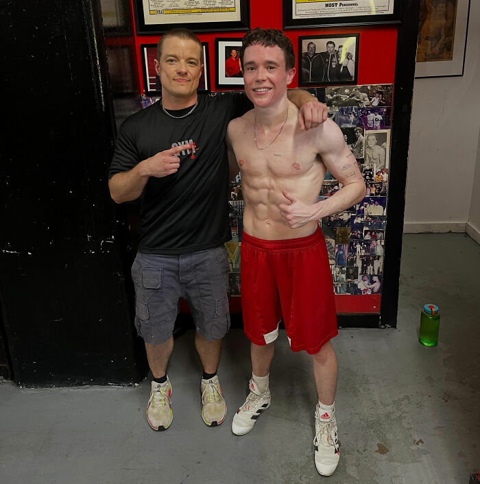 Elliot Page, a trans actor, poses shirtless with an arm around another man after his success in The Odyssey. Elliot Page, a trans actor, poses shirtless with an arm around another man after his success in The Odyssey.