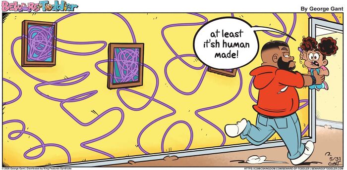 A comic depicting a father holding his toddler in front of a wall covered in scribbles, showcasing the chaos of parenting.