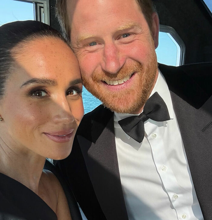 Meghan Markle and Prince Harry smiling, showing warmth despite reports of rude interview rules for staff. Meghan Markle and Prince Harry smiling, showing warmth despite reports of rude interview rules for staff.