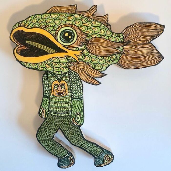 Theo Ellsworth figure of a green humanoid with a large fish head and detailed scales