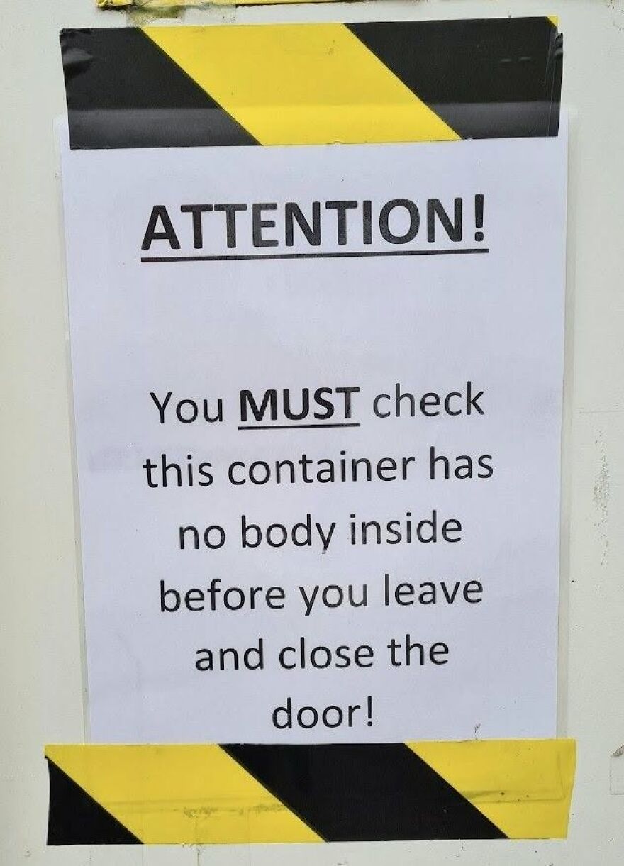 An attention notice sign with a spooky grammar fail writing no body instead of nobody