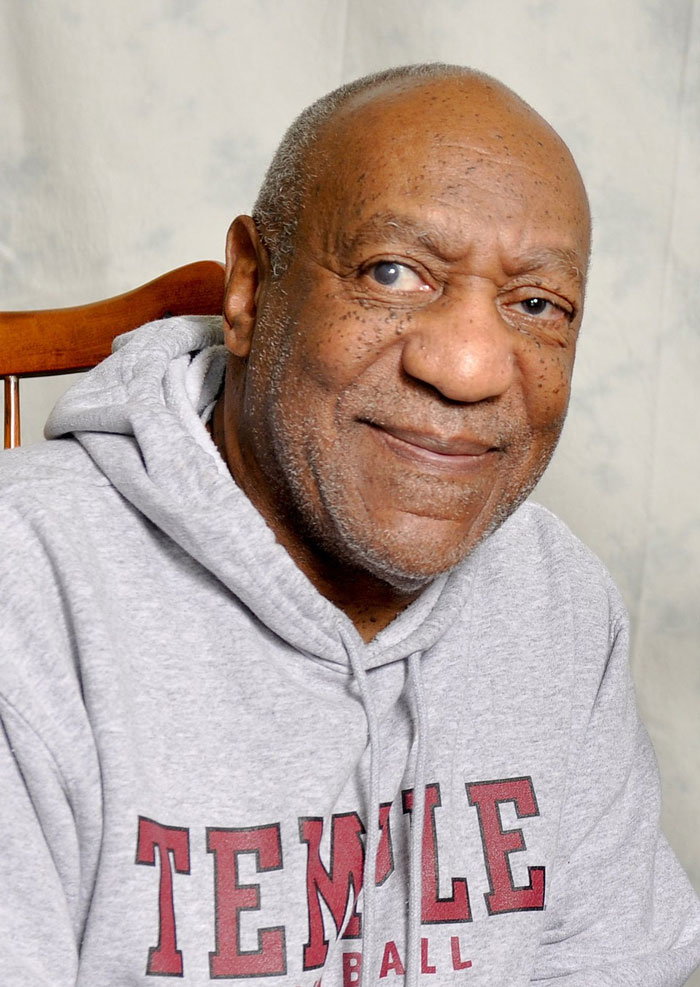 Bill Cosby in a grey hoodie, one of the famous faces with Hollywood secrets.