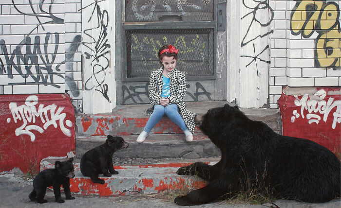 A girl sits on graffiti-covered steps near a black bear and cubs in dystopian paintings by Kevin Peterson.