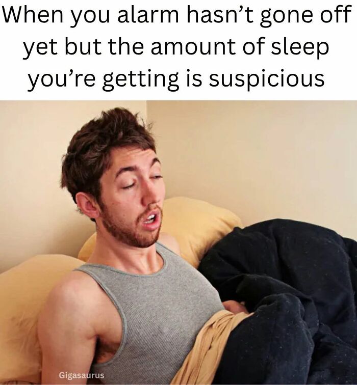 Sleepy man suspicious about amount of sleep before alarm on workday