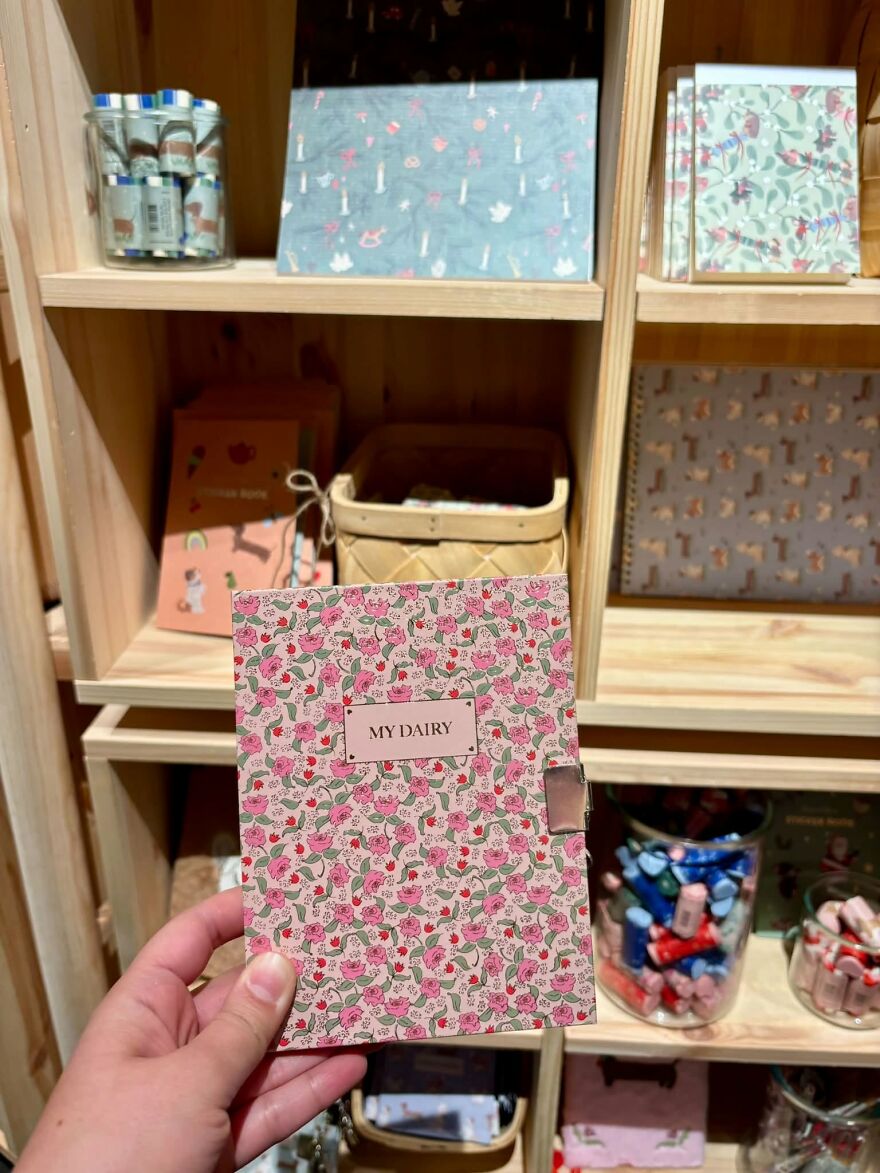 A floral print notebook labeled as My Dairy, a perfect example of grammar fails