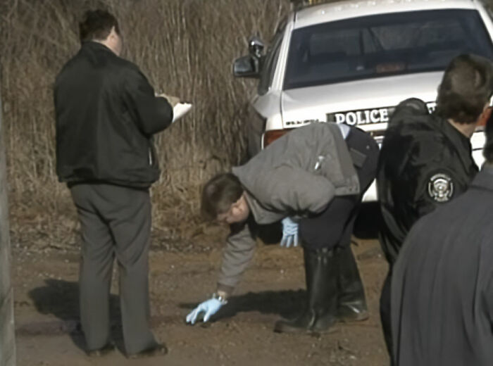 Police officers at a crime scene investigating horrific crimes in Tennessee Police officers at a crime scene investigating horrific crimes in Tennessee