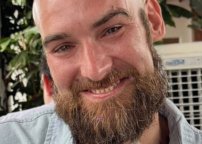 Close-up of the smiling man, the victim of his children's mother who was identified by his last words. Close-up of the smiling man, the victim of his children's mother who was identified by his last words.