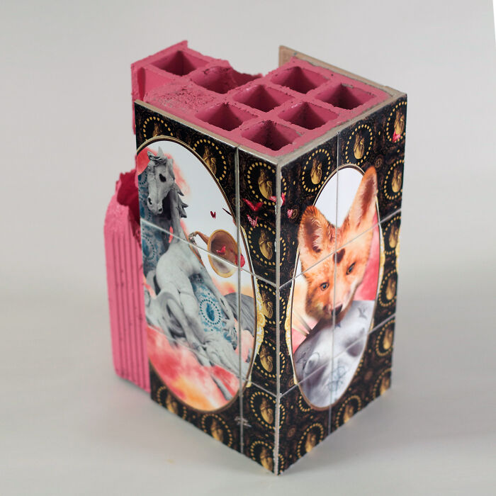 Decorative pink hollow block with tile works showing horse and fox portraits