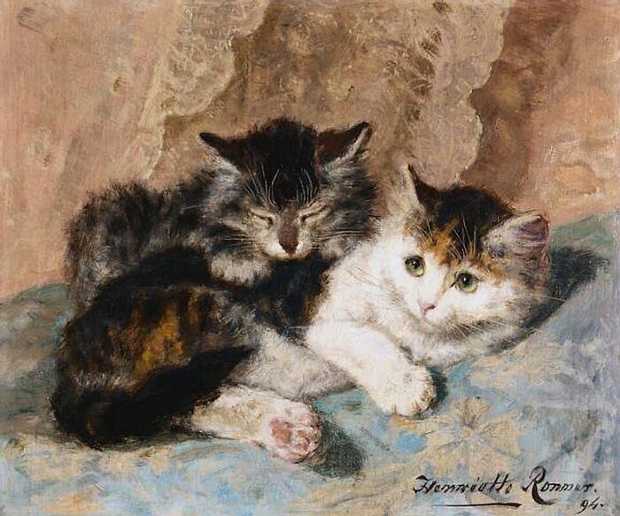 An old cat painting of two adorable kittens lounging on a soft blue surface, one looking at the viewer.