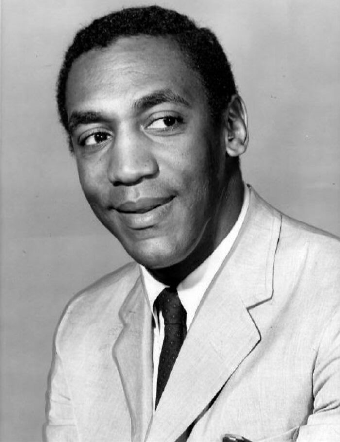 A black and white photo of Bill Cosby, a once-admired public figure whose legacy was destroyed.