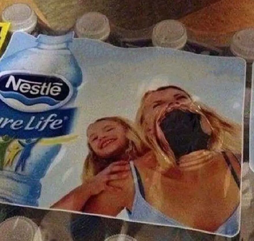 An uncomfortable and disturbing pic of a Nestle water bottle label featuring a woman with a distorted, gaping mouth.