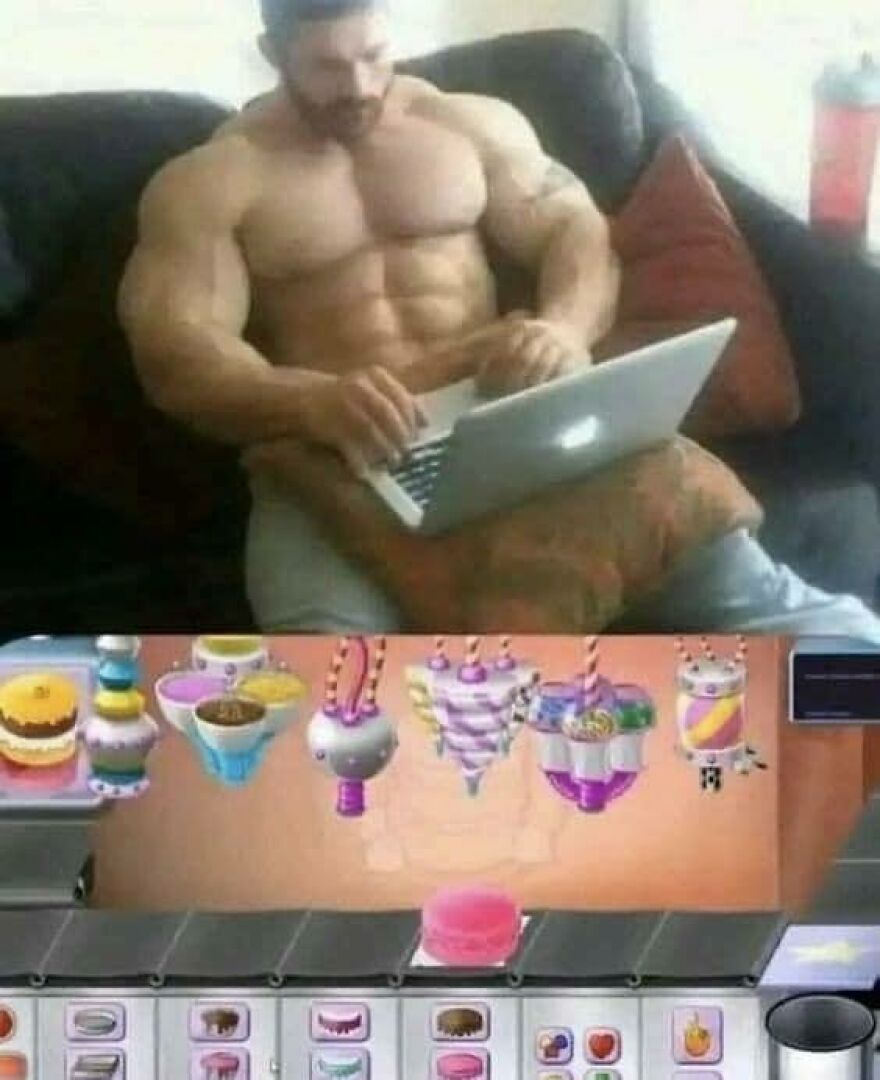 A muscular man on a couch playing a colorful dessert-making game, a somewhat disturbing pic.