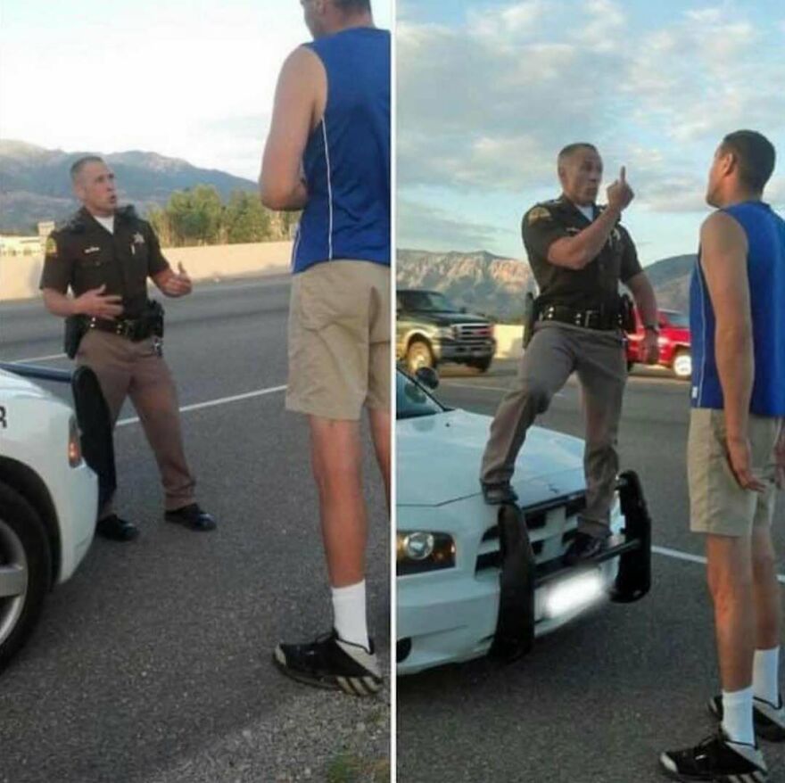 Uncomfortable and disturbing pics of a short police officer standing on his car to argue with a much taller man.