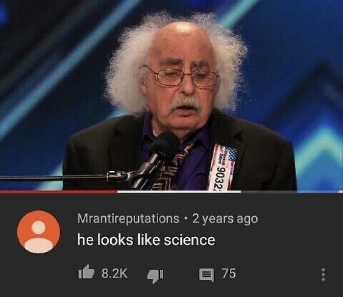 An old man with big hair resembling Albert Einstein with a YouTube comment saying he looks like science, a moment of gold.