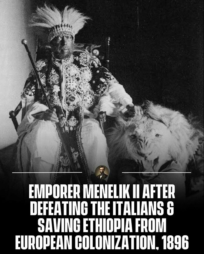 Emperor Menelik II of Ethiopia seated next to a lion in 1896, representing significant photos from history.