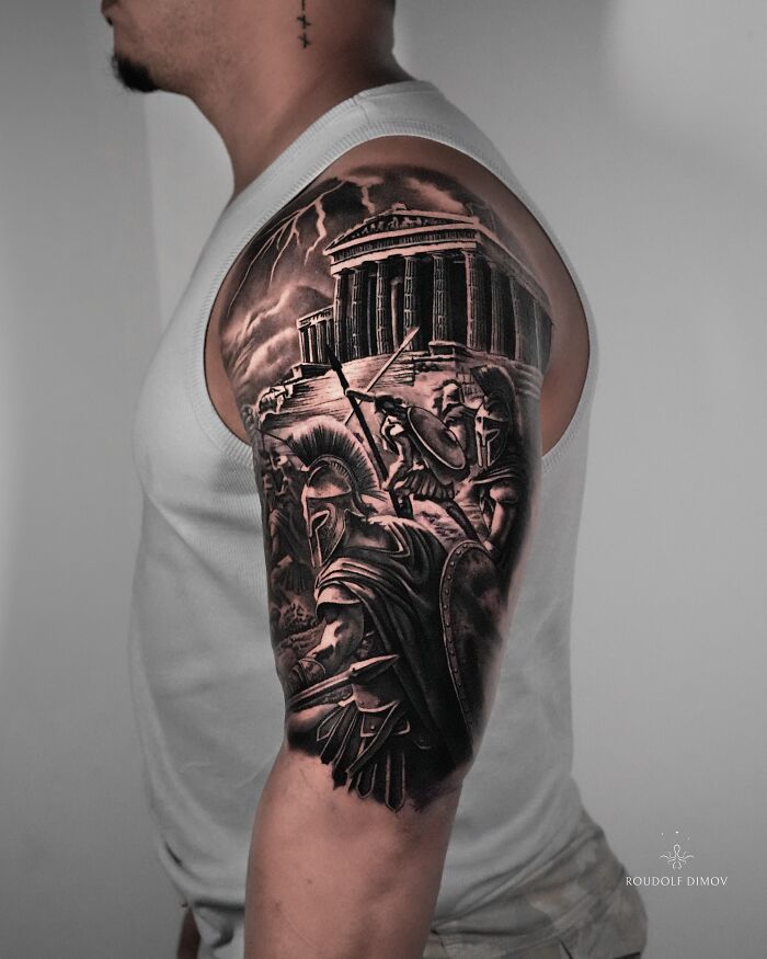 An ancient mythology inspired tattoo with warriors and a temple, a detailed design from Sacred Gold Studio.