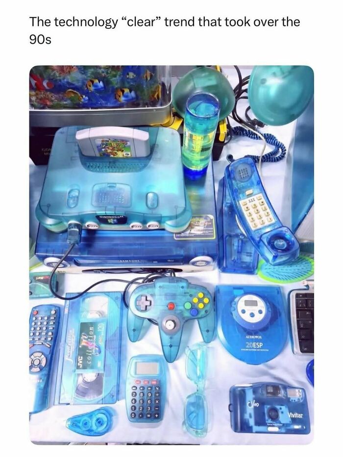 An assortment of clear blue electronics representing 90s nostalgic pics of retro tech trends.