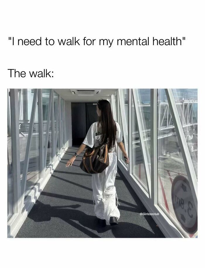 Woman walking down an airport jet bridge representing funny memes about being a woman.