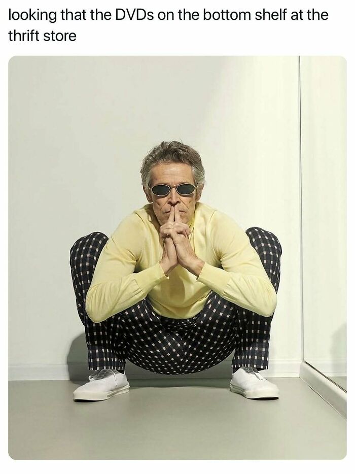 A meme with Willem Dafoe squatting, looking at something intently. Hilarious memes capture relatable everyday moments.