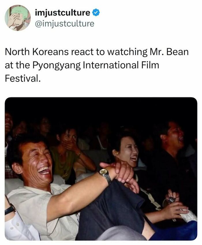 North Koreans laughing heartily while watching Mr. Bean at the Pyongyang International Film Festival.