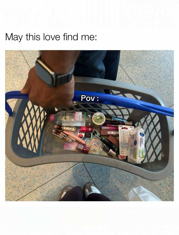 A man holding a shopping basket filled with makeup products, illustrating funny memes about being a woman.