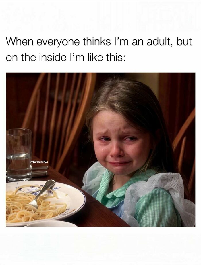 Funny meme about being a woman showing a crying little girl at a dining table with a plate of spaghetti