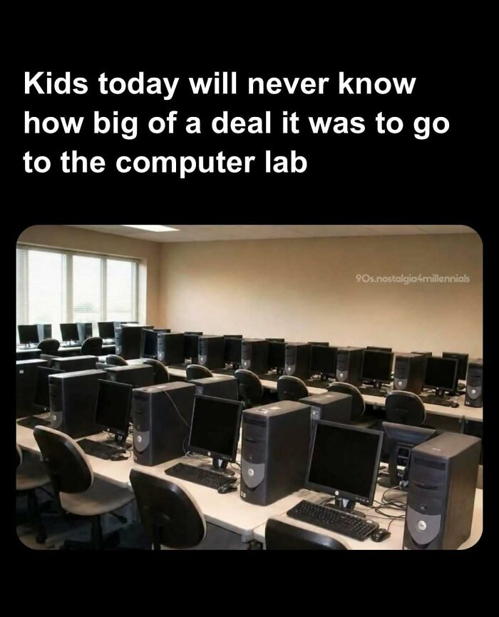 An empty school computer lab with retro CRT monitors from 90s nostalgic pics.