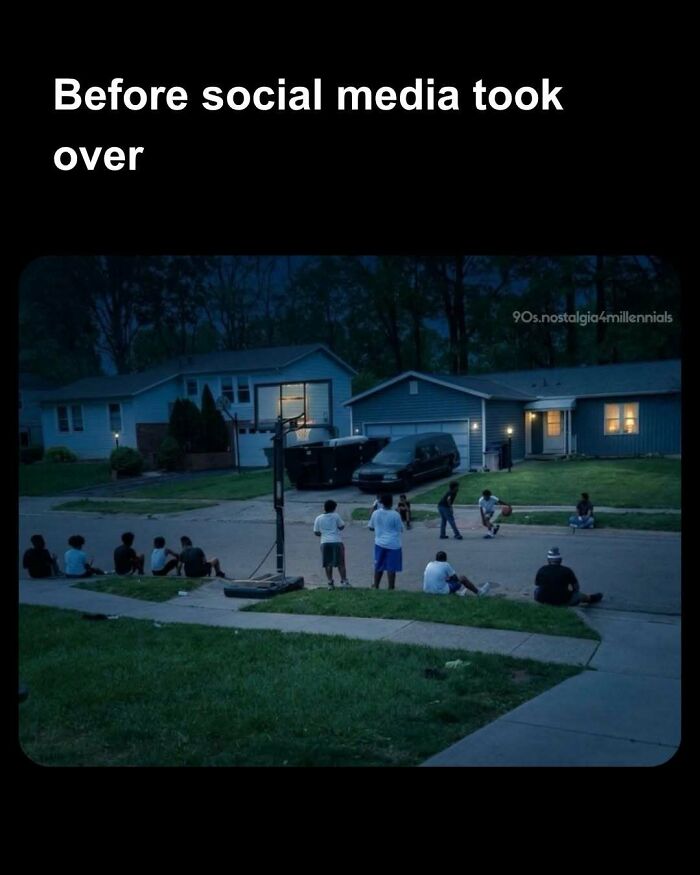 An evening photo of kids playing street basketball, capturing nostalgic pics of pre-social media days