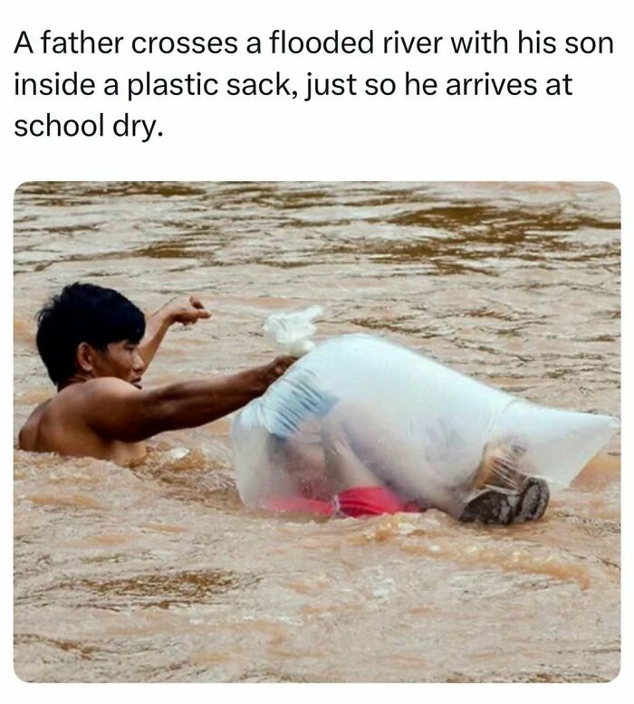 A father swimming across a river towing his son in a plastic bag, from fascinating stories on the internet.