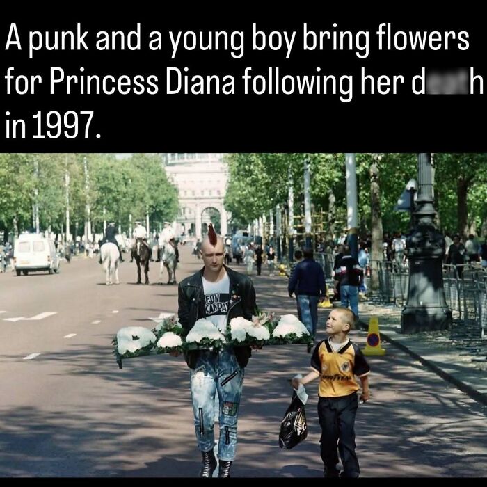 A punk and a young boy carrying flowers for Princess Diana in a remarkable photo from 1997.