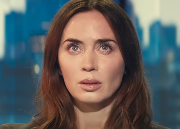Emily Blunt looking startled, representing discussions on Hollywood's plastic surgery obsession in film
