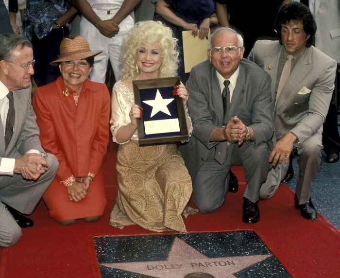 Dolly Parton at her Hollywood Walk of Fame star ceremony, a moment of respect before someone disrespected her legacy. Dolly Parton at her Hollywood Walk of Fame star ceremony, a moment of respect before someone disrespected her legacy.